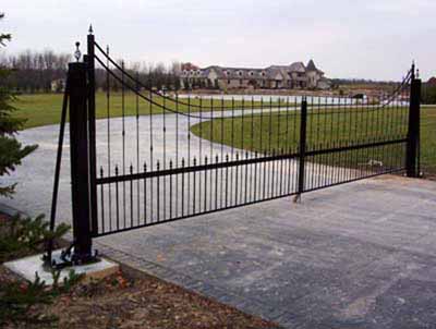 Custom fabricated entry gate with electronic opener