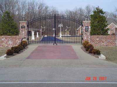 Custom fabricated entry gate with electronic opener